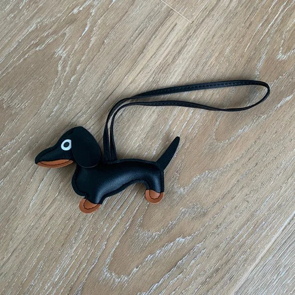 The Sweet Pea Anthropologie Black leather dachshund hanging keychain for bag or car