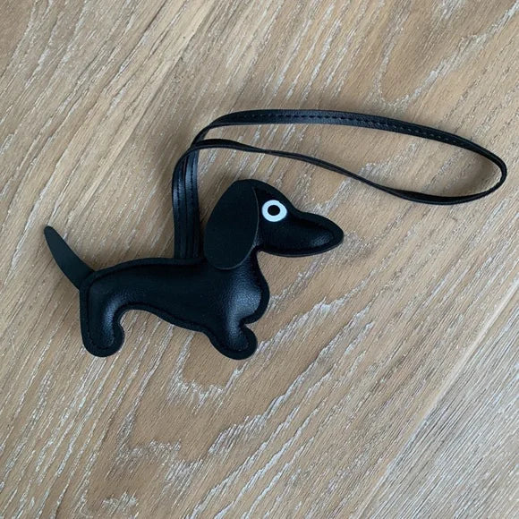 The Sweet Pea Anthropologie Black leather dachshund hanging keychain for bag or car